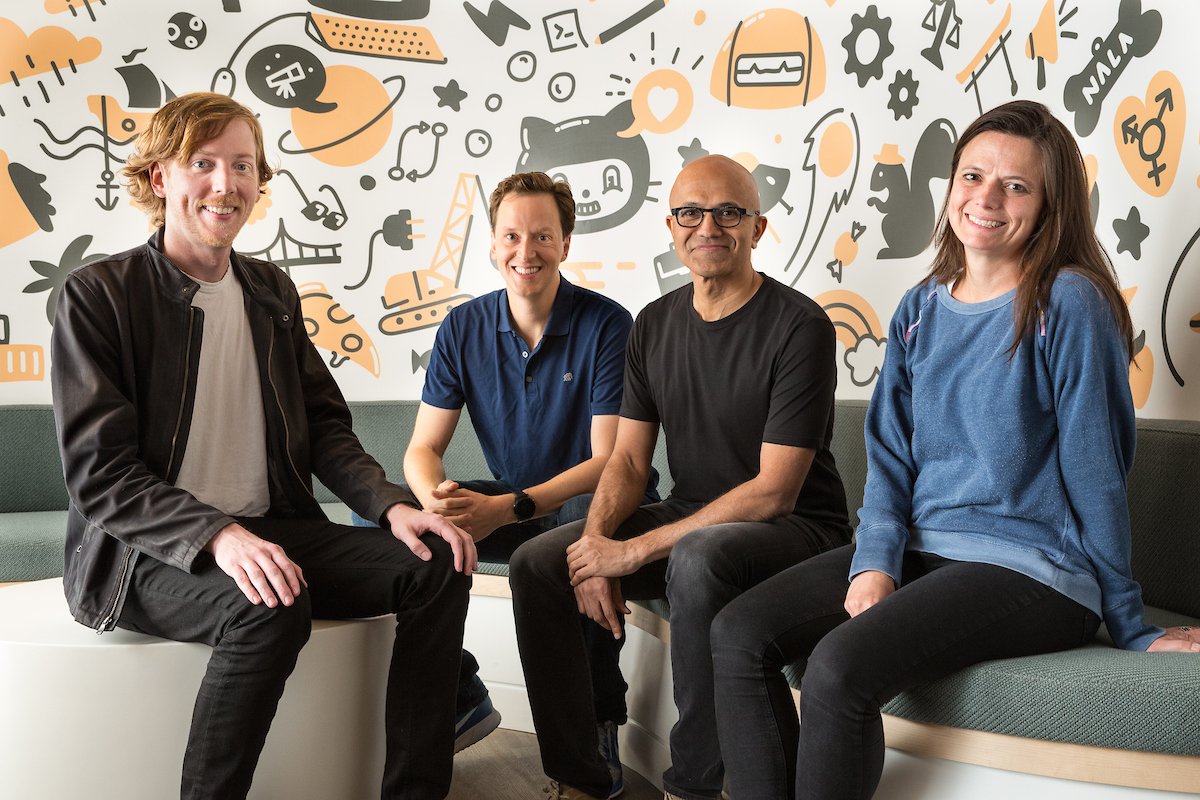 Satya Nadella with GitHub CEO and Microsoft officials
