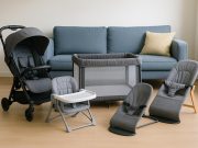 Compact baby stroller, foldable crib, space-saving high chair, and baby gear in modern condo setting