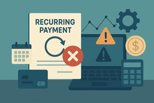 Credit card declined notification on laptop screen with financial charts for recurring payment management