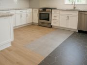Durable ceramic and porcelain tiles in modern kitchen designed for high-traffic floor use