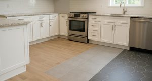 Durable ceramic and porcelain tiles in modern kitchen designed for high-traffic floor use