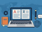 Laptop with multilingual documents and translation tools on a desk for content writers