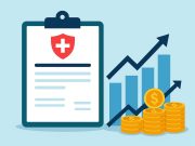 Health insurance policy documents with rising premium charts illustrating renewal cost increase