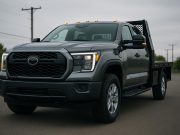 Modern work truck equipped with advanced technology features, dashboard, and digital controls