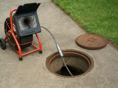 CCTV drain camera detecting cracks and damage in a residential sewer pipe underground
