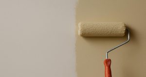 Freshly painted wall drying, illustrating patience and mindfulness in mundane everyday tasks