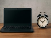 Refurbished laptop with open screen and keyboard on desk, representing laptop longevity