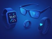 The Future of Wearable Tech: How Smart Devices Are Transforming Everyday Experiences Smartwatch and fitness tracker displaying health metrics, symbolizing wearable technology innovation