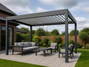 Mastering Alfresco Living: The Ultimate Guide to Modern Louvered Pergolas for UK Weather Modern louvered pergola in a stylish alfresco UK garden setup, showcasing weather protection