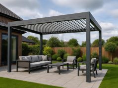 Modern louvered pergola in a stylish alfresco UK garden setup, showcasing weather protection