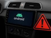 Android head unit with caution sign, highlighting risks and safe buying tips for car owners